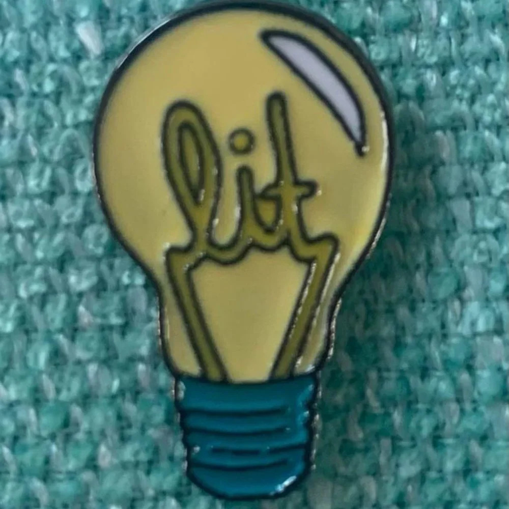 Brand new super cute collectible enamel pin “Lit” light bulb